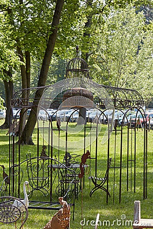 Wrought iron gazebo and outdoor furniture in spring during Tre Giorni per il Giardino fair at Editorial Stock Photo