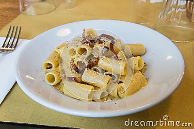 carbonara is Rigatoni alla carbonara is a specialty dish from lazio region and Roma sorround Stock Photo