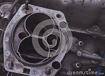 Carburetor of the internal combustion engine of a VAZ 2106. Automobile parts and spare parts Stock Photo