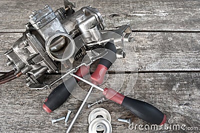 Carburetor and screwdrivers Stock Photo