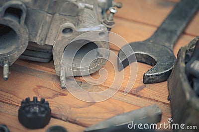 Carburetors for a car engine with tools Stock Photo