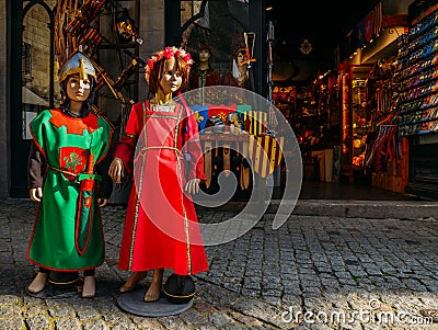 Dolls dressed in medieval clothes in the historic centre of Carcassonne, a hilltop town in southern France Editorial Stock Photo