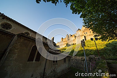 Carcassonne Medieval Citadel Spotlights and Church Saint-Gimer Side Wall Stock Photo