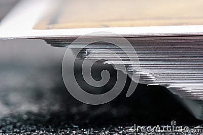 Card Collection: Side View of a Towering Stack of Cards Stock Photo