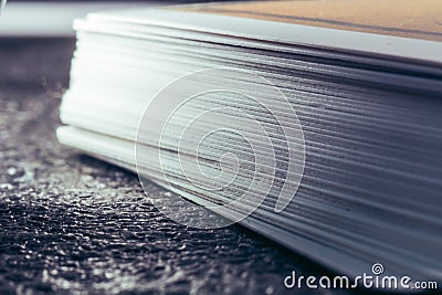 Card Collection: Side View of a Towering Stack of Cards Stock Photo