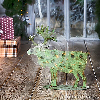 Card With Golden Festive Decoration.Green Moose, Christmas Ball, Hear, Star. Gray, Rustic, Vintage Wooden Background. Copy Space Stock Photo