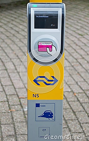Card Reader terminal for Metro RET and Train NS on the platform at railway and tram station Den Haag Laan van NOI in the Netherlan Editorial Stock Photo