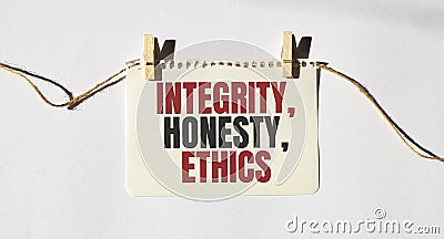 Card with text INTEGRITY, HONESTY, ETHICS. Diagram and white background Stock Photo