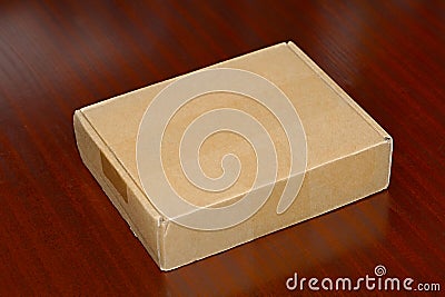 Cardboard Box on a Table Stock Photo