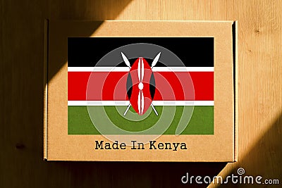 Made in Kenya. Cardboard boxes with text `Made In Kenya` and the Flag of Kenya. Stock Photo