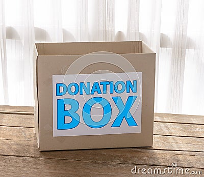 Cardboard donation box Stock Photo