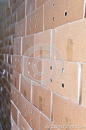 Cardboard packing boxes in a warehouse, background Stock Photo