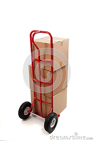 Cardboard shipping box with a tape gun Stock Photo