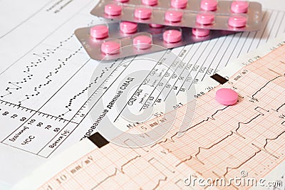 Cardiogram and medication. Stock Photo