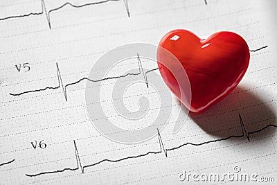 Cardiogram pulse trace and red heart concept for cardiovascular medical exam Stock Photo