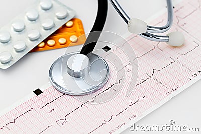 Cardiogram with stethoscope Stock Photo