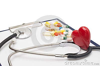 Cardiogram with stethoscope and red heart Stock Photo