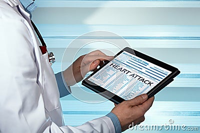 Cardiologist reading Heart Attack diagnosis in digital medical r Stock Photo