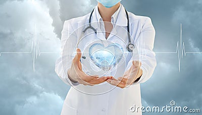 Cardiologist shows a heart in the sky. Stock Photo