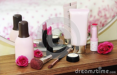 Care and decorative cosmetics, face lotion, body cream, lip gloss, lipstick, makeup a brushes Stock Photo