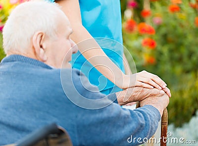 Care for Elderly in Wheelchair Stock Photo