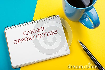 Career opportunities. Office desk table with notepad, pencil and coffee cup. Top view. Stock Photo