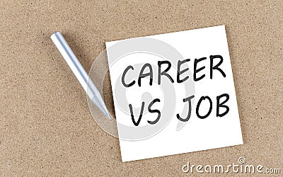 CAREER VS JOBS text on sticky note on a cork board with pencil Stock Photo