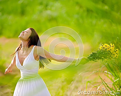 Carefree attractive girl in field Stock Photo