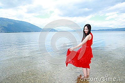 Carefree beauty walk in the sea, healthy living concept, pure happiness and freedom Stock Photo