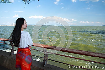 Carefree beauty at Yunnan Dianchi Lake, healthy living concept, pure happiness and freedom Stock Photo