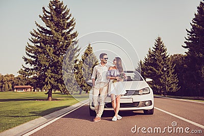 Carefree, cheerful married family, rent transport trip, relax, c Stock Photo