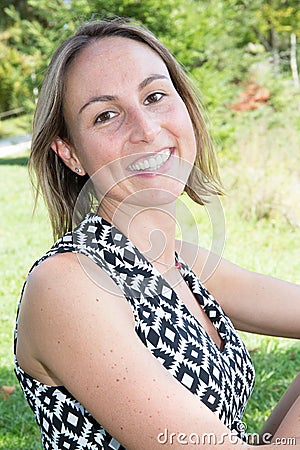 Carefree woman in fields being happy outdoors Stock Photo