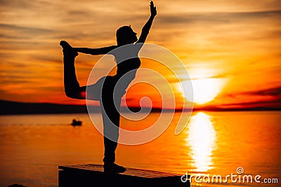 Carefree woman meditating in nature.Finding inner peace.Yoga practice.Spiritual healing lifestyle.Enjoying peace,anti-stress Stock Photo