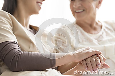 Caregiver in the nursing home Stock Photo