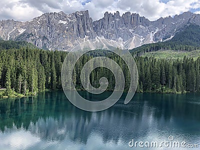 Carezza lake and Latemar panorama, Trentino alto Adige Dolomite alps Stock Photo