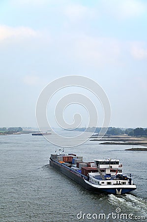 Cargo boat at the river Stock Photo