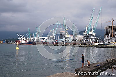 Cargo cranes in the water area of the port of Batumi Editorial Stock Photo