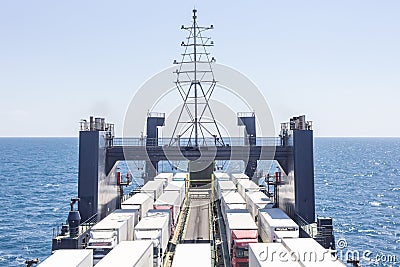 A lot of heavy transport on a cargo ferry at sea Editorial Stock Photo