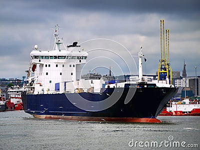 Cargo Ferry Underway Leaving Harbour. Stock Photo