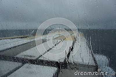 Cargo ferry voyage in a rainy day Stock Photo