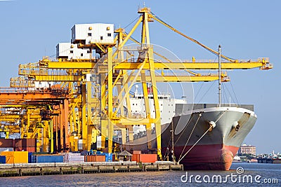 Cargo industrial ship at Port Stock Photo