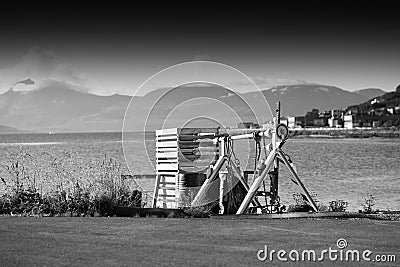 Cargo loader machine in Tromso port background Stock Photo