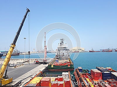 Cargo operations ongoing onboard supply vessel. Logistics background Editorial Stock Photo