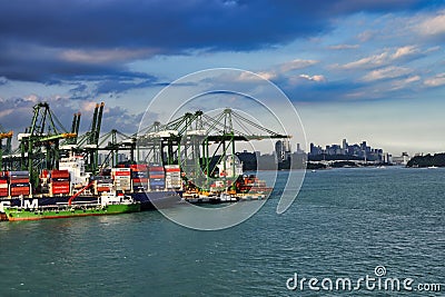 The cargo port of Singapore with docked container ships and container cranes Editorial Stock Photo