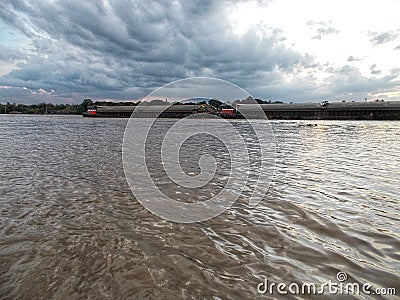 Cargo ship along over Chao praya river,bangkok Thailand. Stock Photo