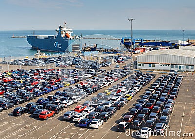 A cargo ship bringing new cars into Ramsgate Royal Harbour Editorial Stock Photo