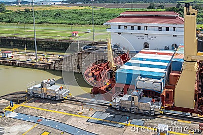 Cargo Ship crossing Panama Canal at Miraflores Locks - Panama City, Panama Editorial Stock Photo