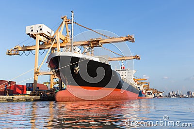 Cargo ship in the harbor for logistic import export background Stock Photo