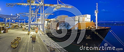 Cargo ship by night Stock Photo