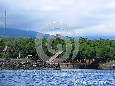 Cargo ship in port in Bali Stock Photo